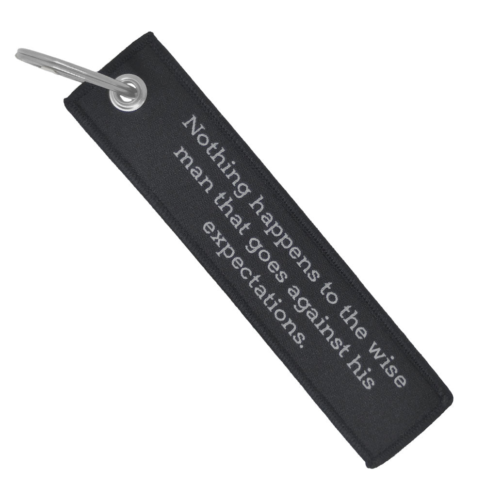 Double-sided embroidered Fabric Keychain with Premeditatio Malorum Phrase 13 x 3 cm
