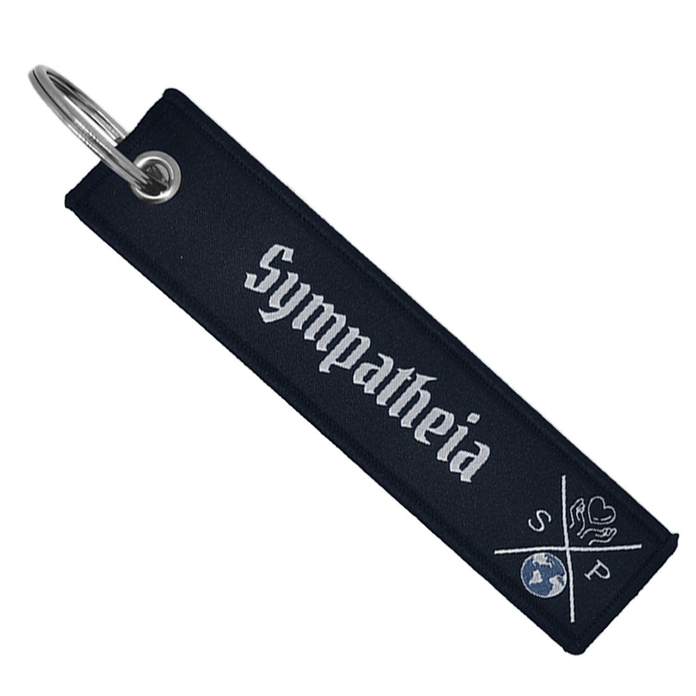 Llavero de Tela bordado a doble cara con Frase Estoica Sympatheia 13 x 3 cm